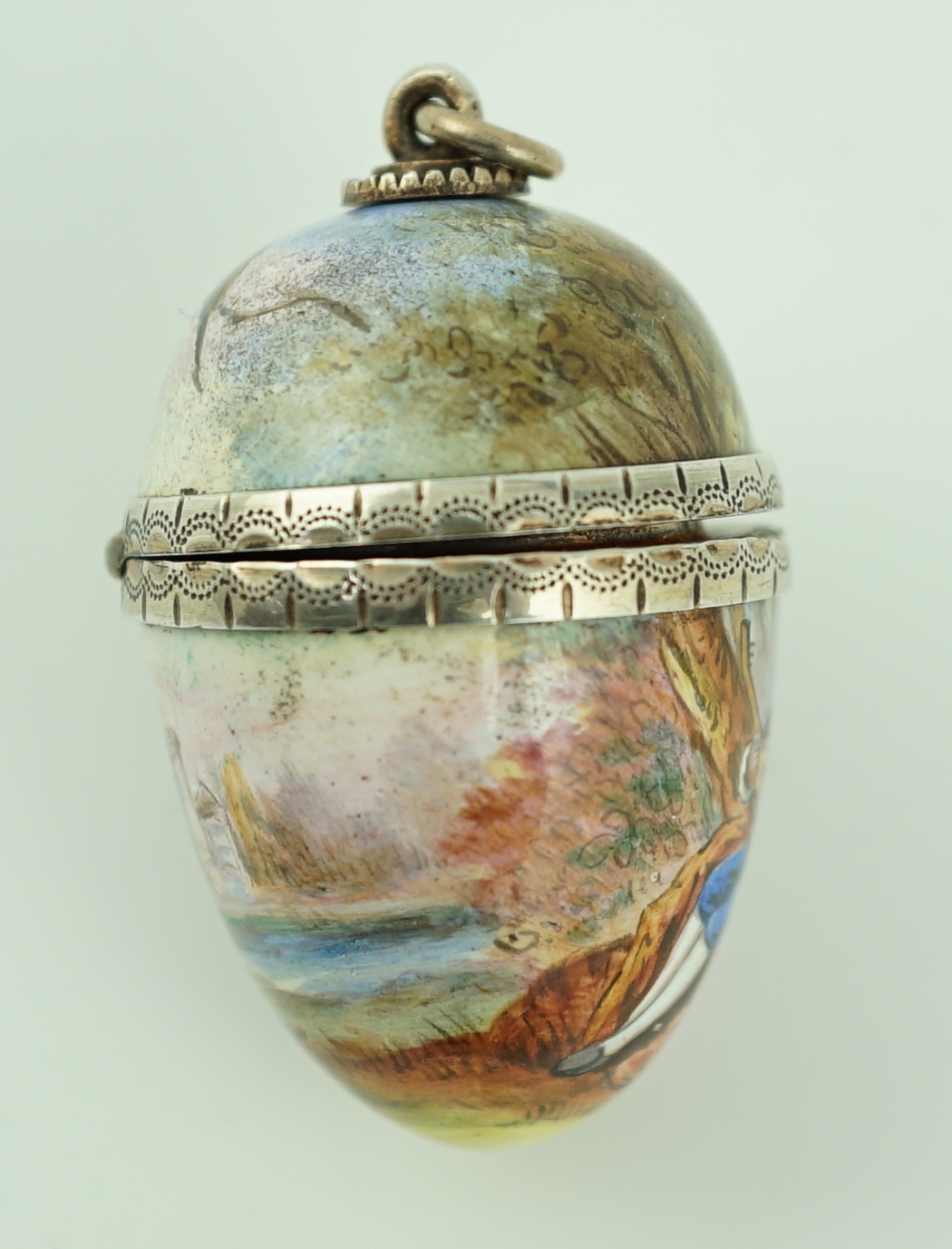 A 19th century Viennese? white and yellow metal mounted enamelled egg shaped vinaigrette, maker, Ludwig Politzer?